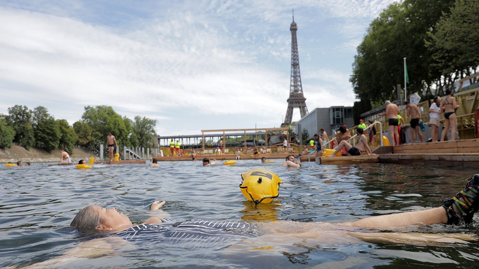 Once-polluted Paris river reopens for public swimming after Olympics rush to clean it up University Australia